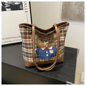 Stylish brown plaid tote bag for women with cute teddy bear plush applique, large capacity.