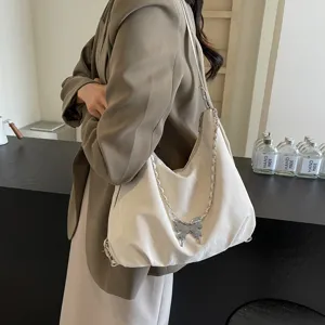 Stylish soft slouchy shoulder bag for women with metal butterfly chain strap casual dumpling bag