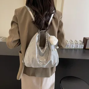 Stylish metallic hobo backpack for women, soft large capacity shoulder dumpling bag with butterfly.