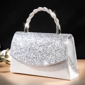 Sparkling silver glitter evening bag with twisted rhinestone handle for party and wedding.