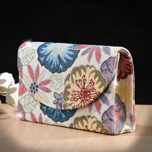 Vintage floral tapestry evening clutch bag, elegant woven fabric crossbody bag for banquet party.