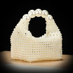 Handmade faux pearl beaded handbag for women, elegant hollow design chic vintage evening wrist bag.