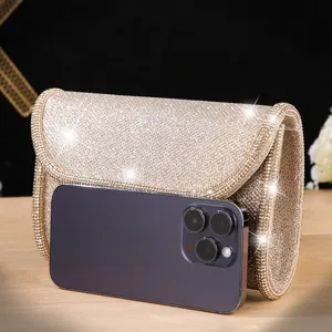 Sparkling rhinestone evening clutch detail shot, glamorous party purse accessory design.