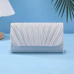 Silver pleated evening clutch bag for women, elegant fashion handbag for wedding parties.