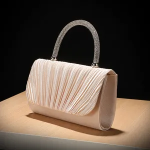 Elegant pleated evening clutch with crystal rhinestone handle, perfect for weddings and parties.