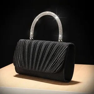 Elegant black pleated evening handbag with sparkling rhinestone handle for party wedding.