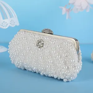 Elegant pearl evening clutch bag with sparkling rhinestones, stylish bridal purse for women