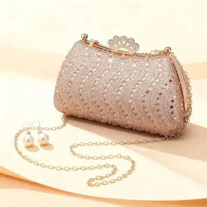 Elegant rhinestone evening clutch bag with chain strap and pearl earrings detail showcase.