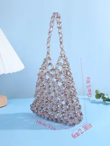 Beaded crystal evening bag detail view, hollow design elegant luxury ladies handbag.
