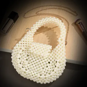 Handmade pearl evening bag with gold chain strap, elegant shoulder bag for women parties.