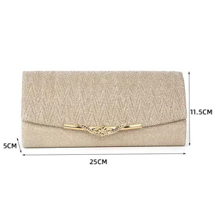 Gold glitter evening clutch bag detail showing 25cm length and elegant metallic floral clasp.