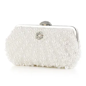 Elegant pearl clutch bag with rhinestones, perfect for evening parties and wedding dresses.