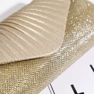 Elegante borsa da sera dorata e glitterata per donna, perfetta per matrimoni e feste.