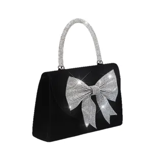 Black evening bag with sparkling rhinestones, elegant bow clutch purse for women parties.