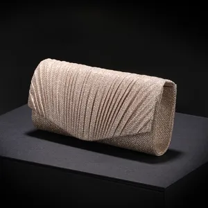 Elegant pleated evening clutch bag in champagne gold, perfect for parties and formal events.