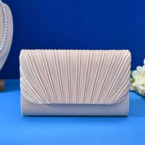 Champagne pleated evening clutch bag detailed view, elegant bridal handbag for formal events.