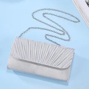 Silver pleated evening clutch bag with chain strap, elegant shoulder crossbody bag for women.