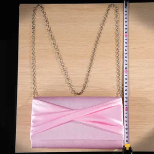 Pink pleated satin evening clutch bag with metal chain strap for wedding bridesmaid dress.