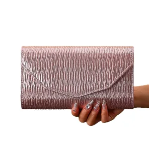 Elegant pink PU leather pleated evening clutch bag for women, chic flap crossbody shoulder bag.