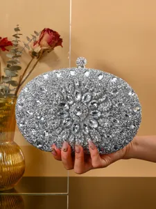 Crystal rhinestone evening clutch bag detail, luxury sparkling bridal purse for party.