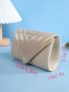 Exquisite beaded embroidery evening clutch bag detail showing delicate craftsmanship and size.