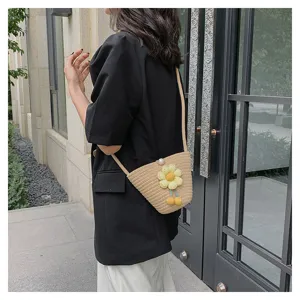 Summer cotton woven mini bucket bag with cute yellow flower decor, stylish crossbody bag.