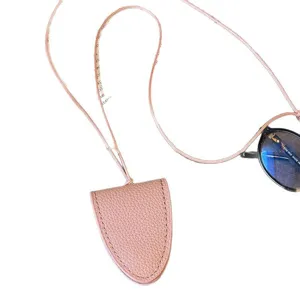 Pink leather glasses case lanyard necklace, stylish niche eyewear holder accessory for women.
