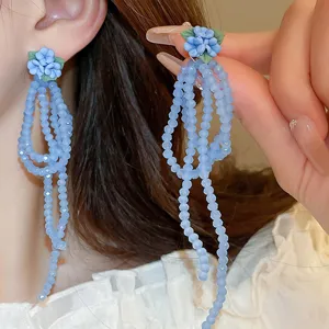 Elegante blaue Kristall Blumen lange Perlen Quasten Ohrringe für Damen Mode Schmuck.