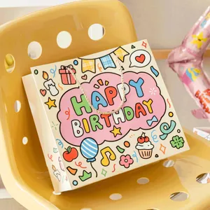 Χαριτωμένη χάρτινη τσάντα δώρου με χαρούμενα σχέδια γενεθλίων και πρακτικό χερούλι.