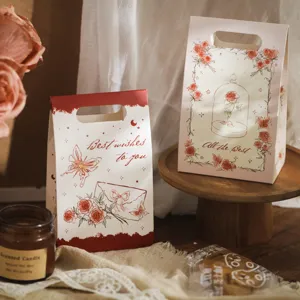 Decorative paper candy gift box with elegant butterfly and rose illustration for party.