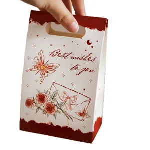 Cute butterfly rose paper candy gift box with handle for kids birthday party and snacks.