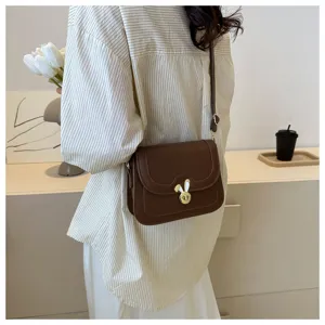 Brown leather crossbody bag with cute bunny clasp, minimalist daily shoulder bag for women.