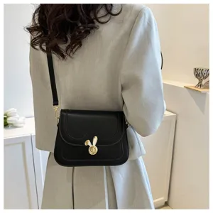 Black crossbody shoulder bag for women, trendy small square bag with cute bunny metal lock.