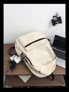 Minimalist beige casual backpack for students, stylish daily daypack with front zip pocket.