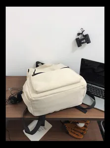 Minimalist casual backpack for men, stylish daily school bag with spacious compartments.