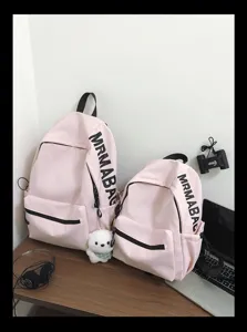 Pink minimalist casual backpack set for women students, cute school book bag daily use.