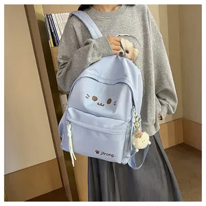 Cute light blue casual school backpack detail view, lightweight student daypack with lovely print.