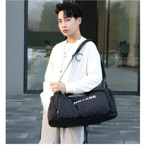 Black large capacity travel duffel bag for men and women, perfect for gym and short trips.