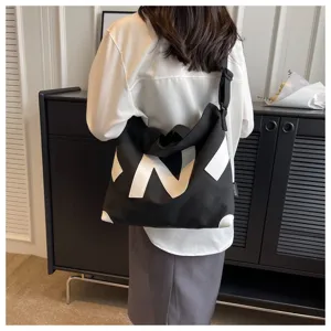 Canvas shoulder bag for women, Japanese style tote bag with large letter design, casual daily use.