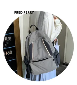 Casual grey backpack for students, lightweight nylon school bag with reflective strips for daily use.