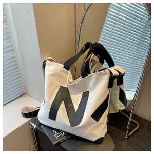 Canvas tote bag for women, Japanese style student shoulder bag, casual crossbody bag.