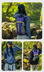 Outdoor hiking backpack with ergonomic shoulder straps, breathable purple and grey design.