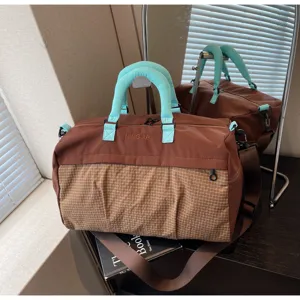 Large capacity travel fitness bag with dry wet separation, stylish brown design for daily use.
