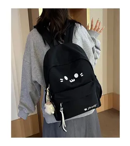 Cute cartoon cat face black casual backpack, lightweight travel school bag for girls, ideal daily use.