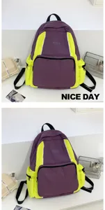 Detailed view of the stylish purple and yellow colorblock casual backpack for students.