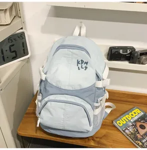 Zaino casual blu da donna, elegante borsa da scuola da viaggio dal design giapponese per l'uso.