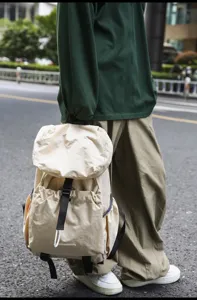 Lightweight beige casual backpack detail, perfect for short trips, daily commute and students.