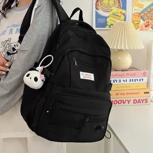 Grande zaino nero da donna, borsa scolastica casual minimalista con tasche multiple giornaliera.