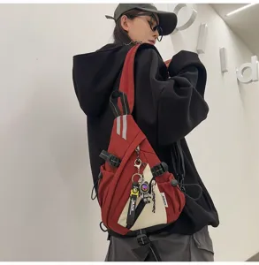 Zaino monospalla rosso e bianco elegante per uomo e donna, borsa streetwear alla moda