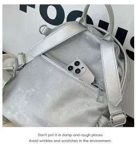 Silver metallic women backpack commuter casual travel daypack with front zipper pocket stylish
